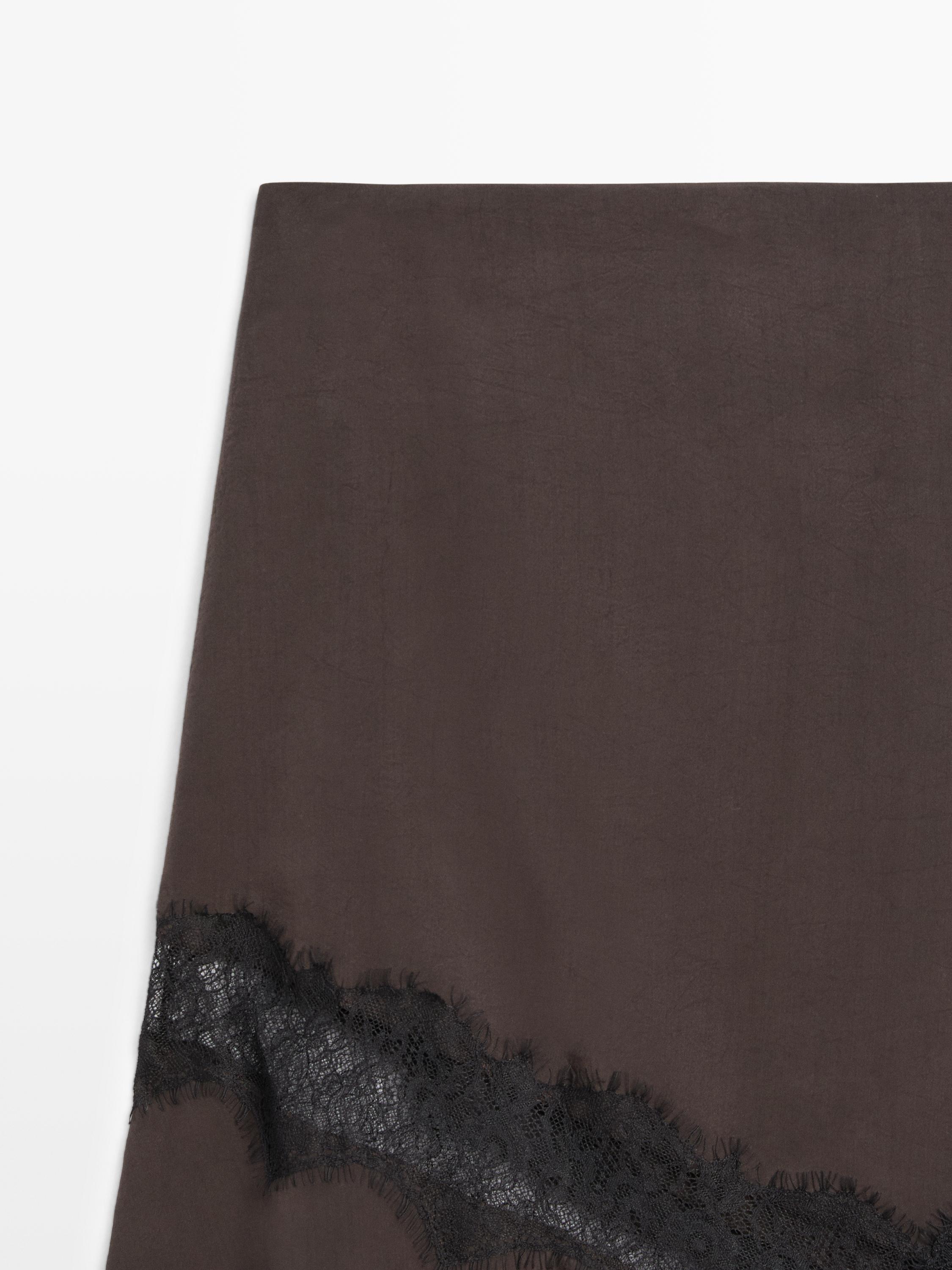 Jupe midi fluide asymétrique à dentelle